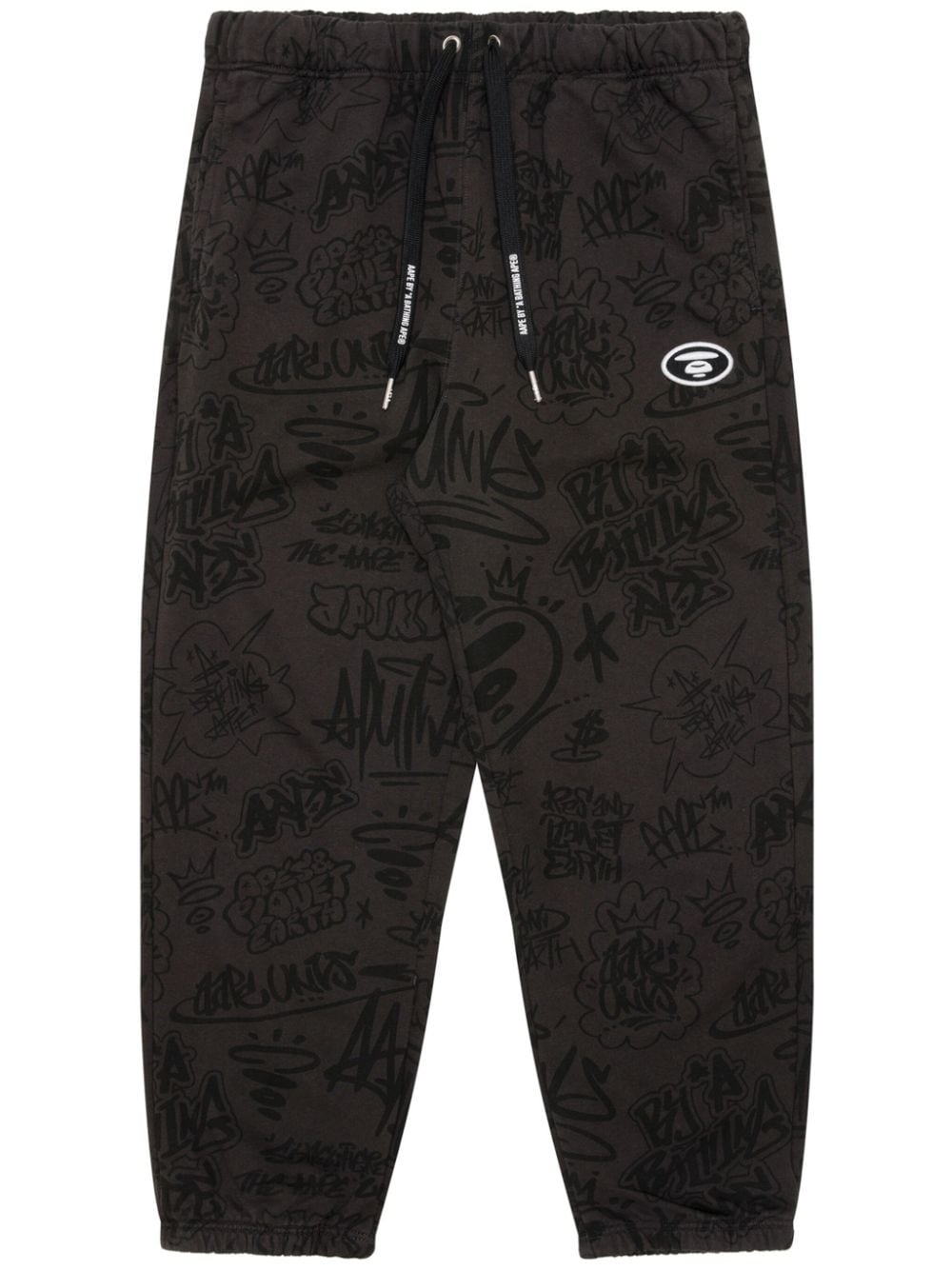 AAPE BY *A BATHING APE® graffiti-print track pants - Brown von AAPE BY *A BATHING APE®