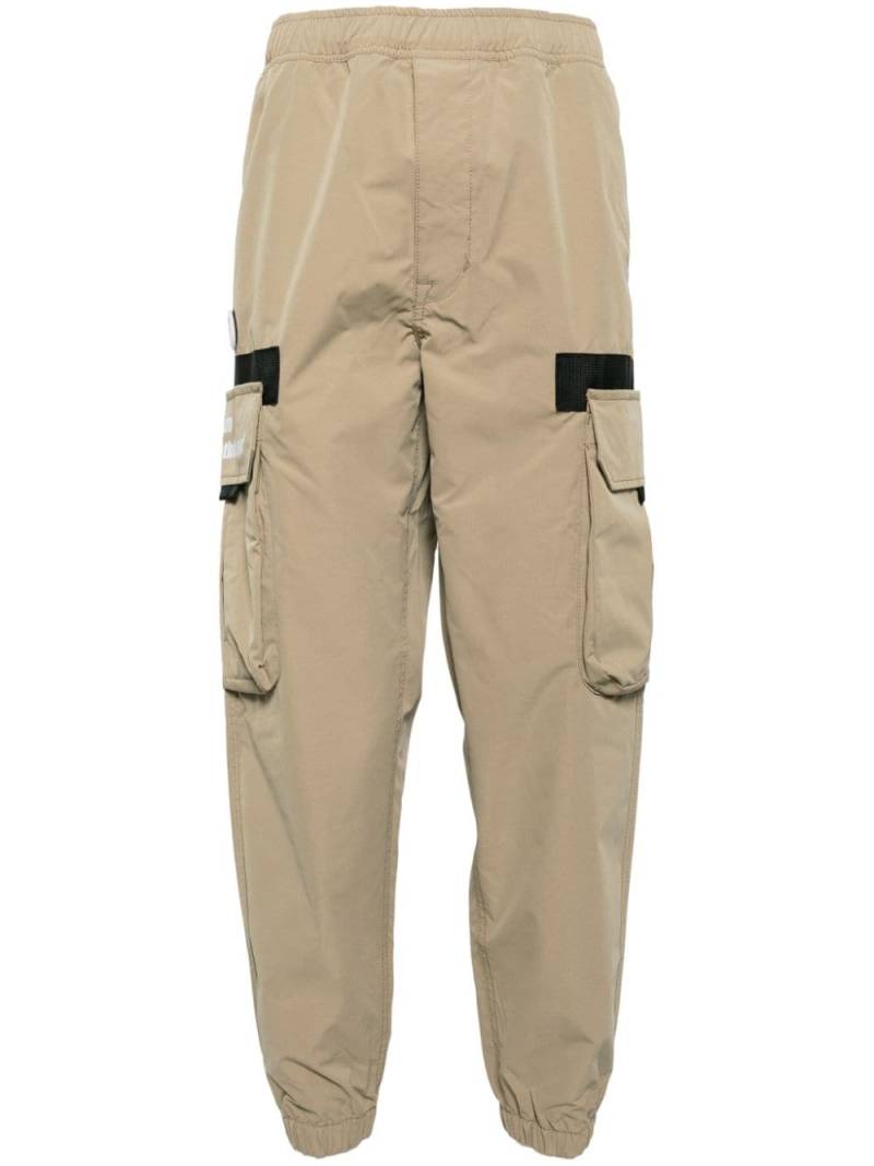 AAPE BY *A BATHING APE® logo-appliqué tapered cargo trousers - Neutrals von AAPE BY *A BATHING APE®