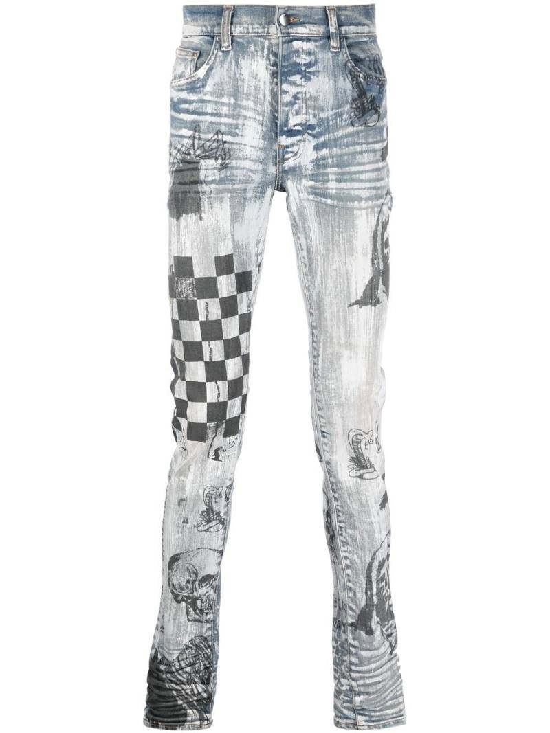 AMIRI graffiti-print slim jeans - Blue von AMIRI