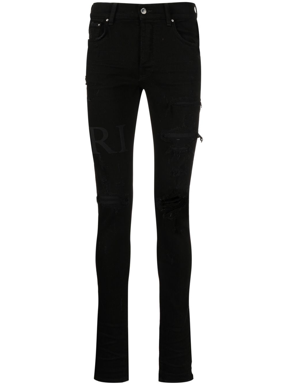 AMIRI ripped-knee logo-print skinny jeans - Black von AMIRI