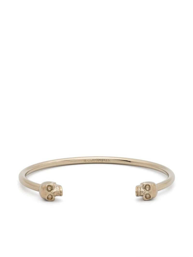 Alexander McQueen twin skull bracelet - Gold von Alexander McQueen