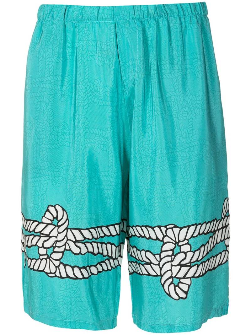 Amir Slama x Mahaslama graphic-print silk bermuda shorts - Blue von Amir Slama