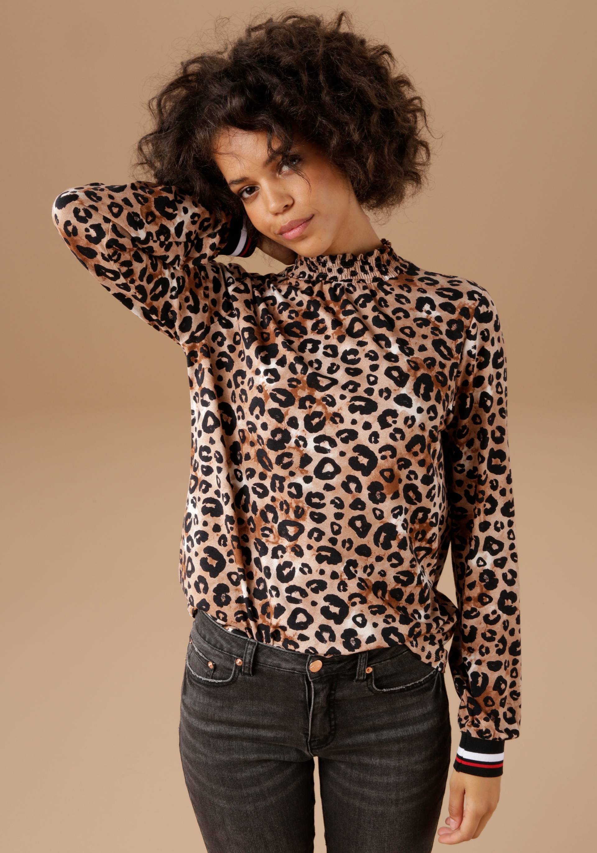 Aniston CASUAL Langarmshirt, mit trendigem Animal-Print und gestreiften Bündchen Aniston CASUAL Langarmshirt, mit trendigem Animal-Print und gestreiften Bündchen von Aniston CASUAL