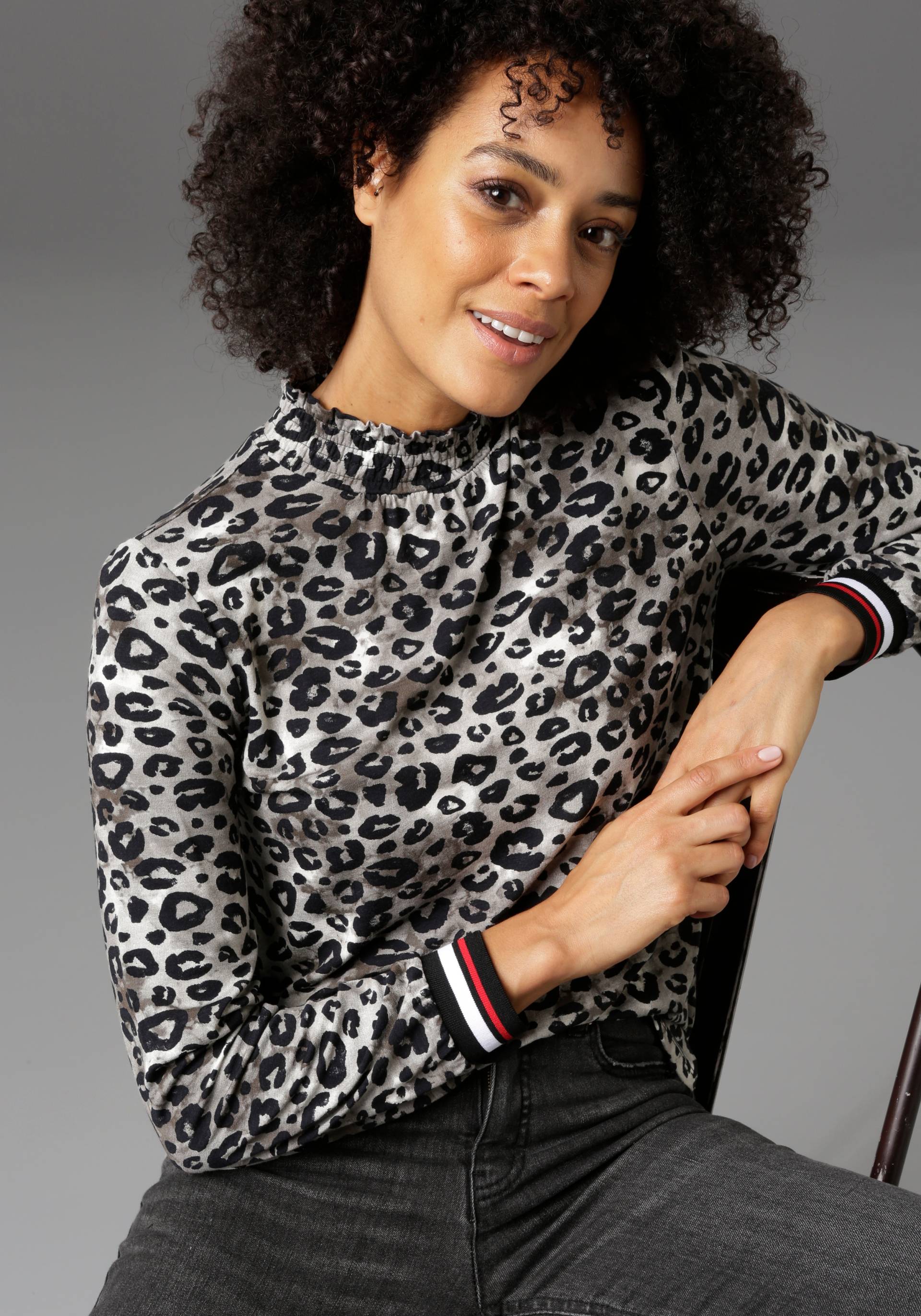 Aniston CASUAL Langarmshirt, mit trendigem Animal-Print und gestreiften Bündchen Aniston CASUAL Langarmshirt, mit trendigem Animal-Print und gestreiften Bündchen von Aniston CASUAL