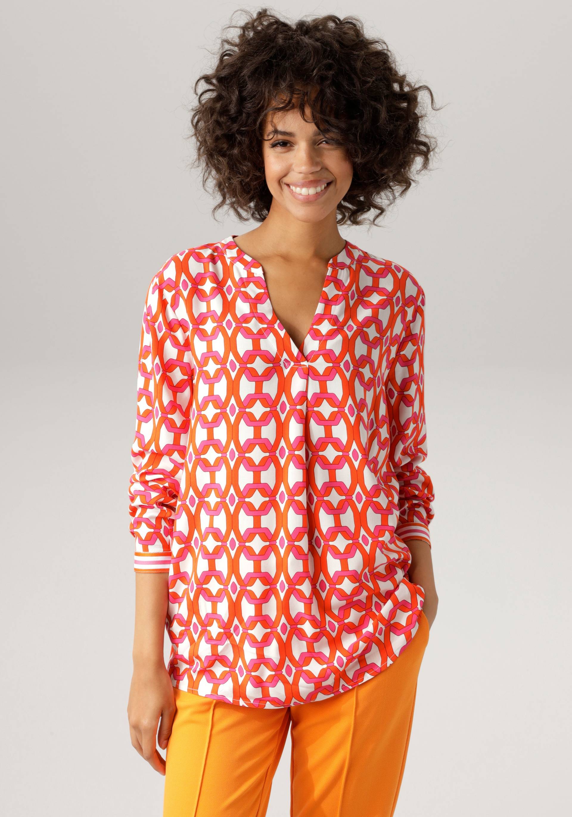 Aniston CASUAL Schlupfbluse, mit extravagantem, graphischem Druck Aniston CASUAL Schlupfbluse, mit extravagantem, graphischem Druck von Aniston CASUAL