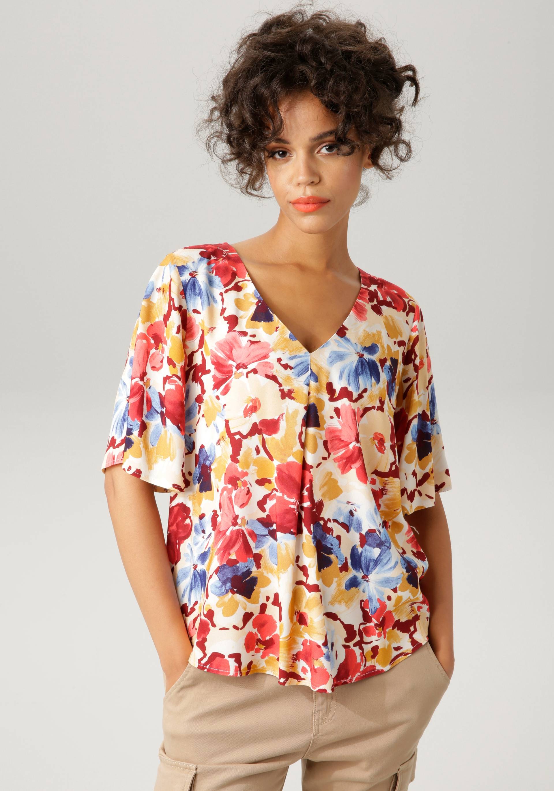 Aniston CASUAL Schlupfbluse, mit farbintensiven Blüten bedruckt Aniston CASUAL Schlupfbluse, mit farbintensiven Blüten bedruckt von Aniston CASUAL