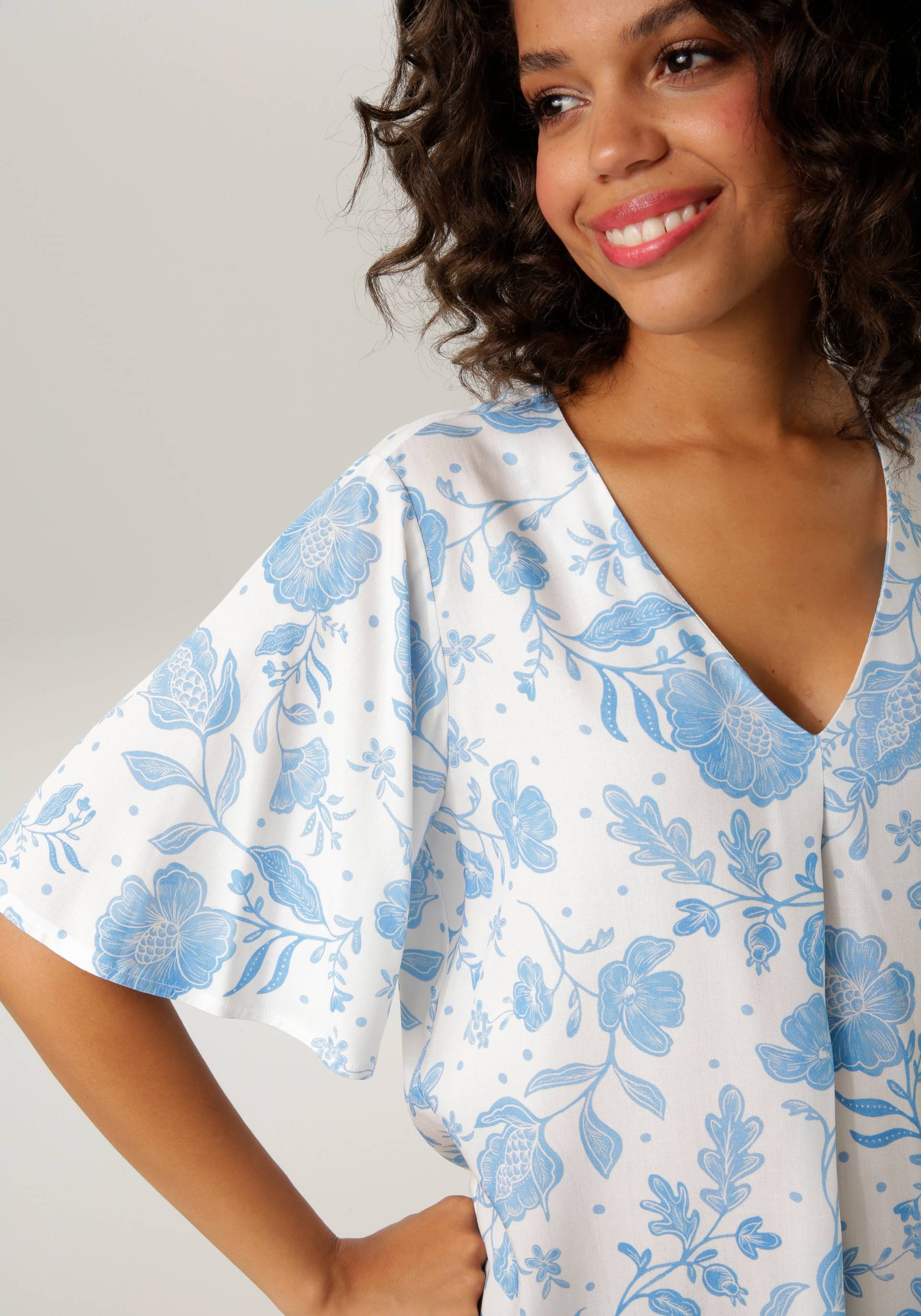 Aniston CASUAL Schlupfbluse, mit grossflächigem Blumendruck Aniston CASUAL Schlupfbluse, mit grossflächigem Blumendruck von Aniston CASUAL
