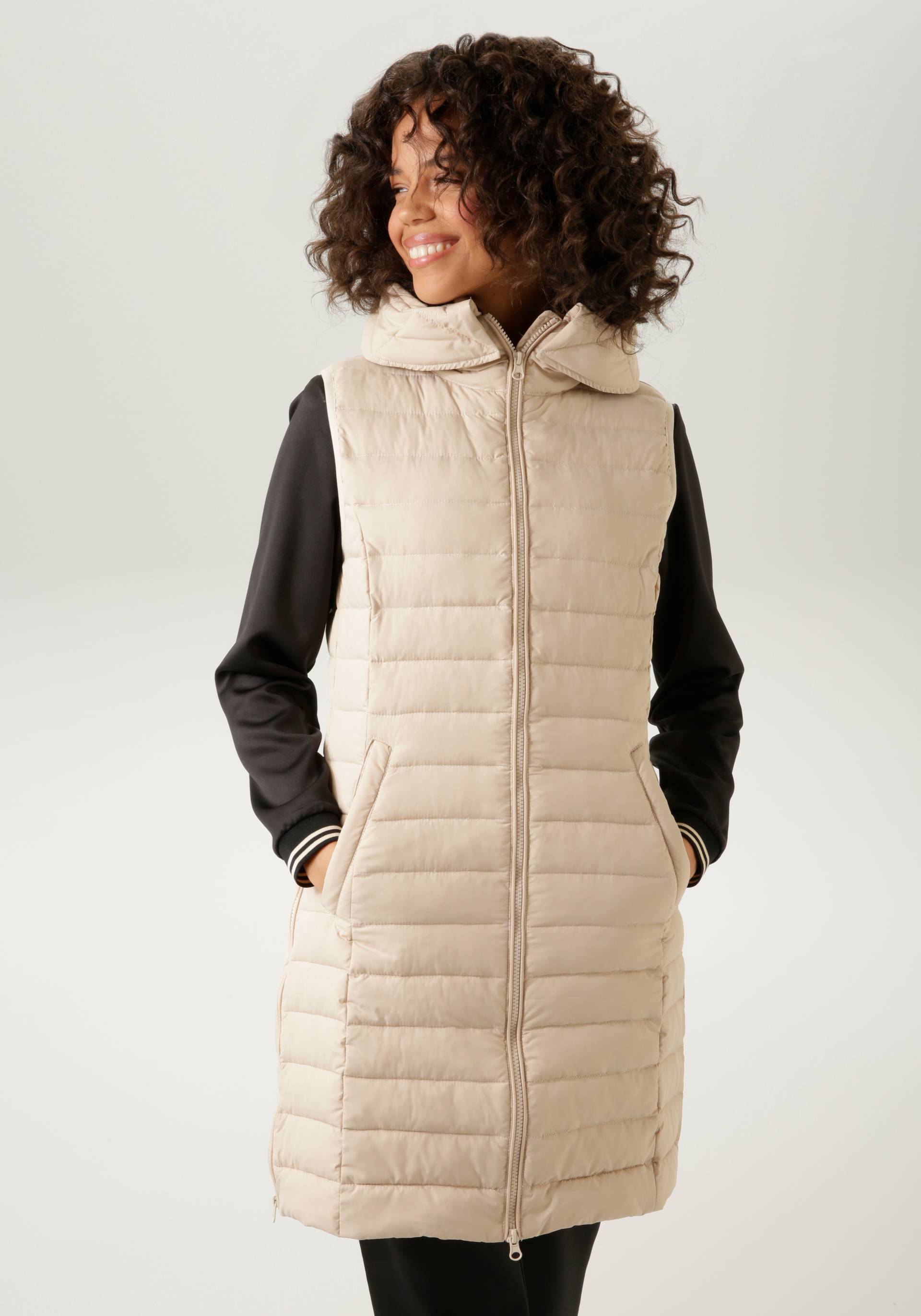 Aniston CASUAL Steppweste, mit verstellbarer Kapuze Aniston CASUAL Steppweste, mit verstellbarer Kapuze von Aniston CASUAL
