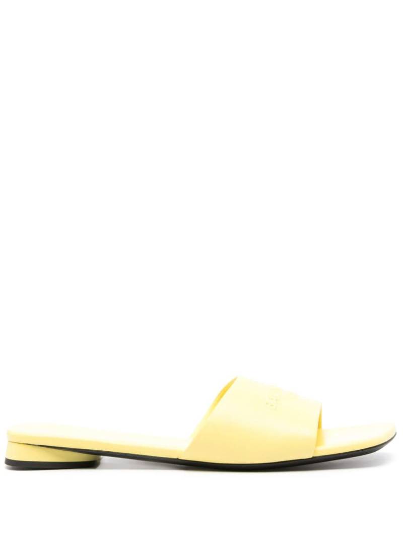 Balenciaga Duty Free leather slides - Yellow von Balenciaga