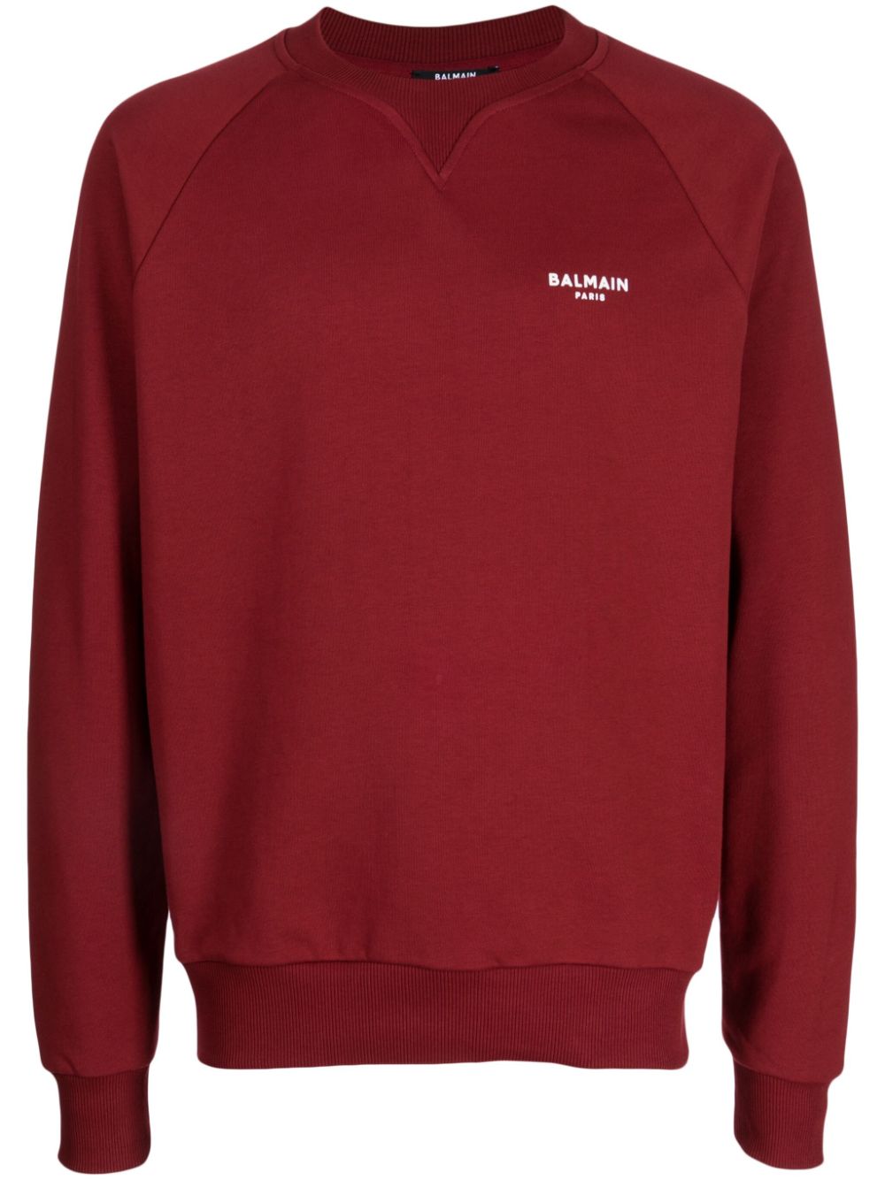 Balmain flocked-logo cotton raglan sweatshirt - Red von Balmain