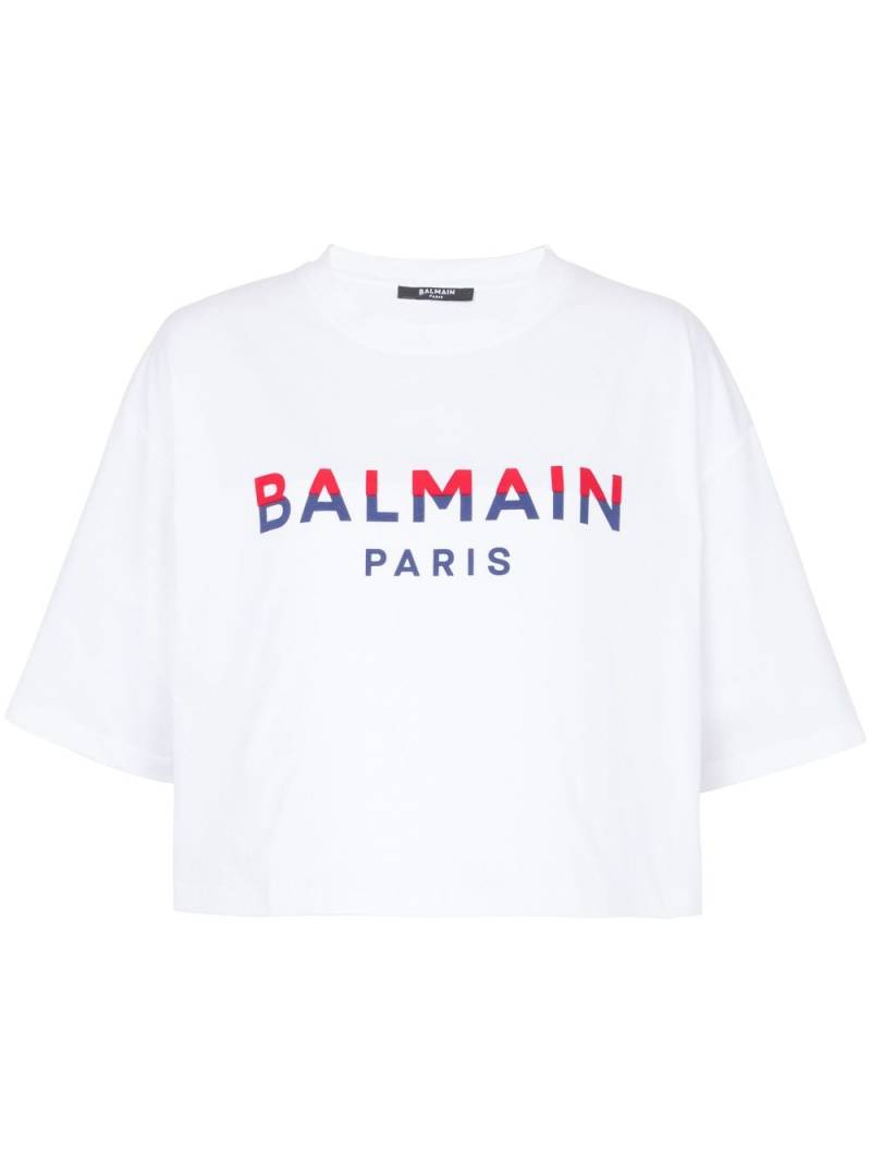 Balmain flocked-logo cropped organic-cotton T-shirt - White von Balmain