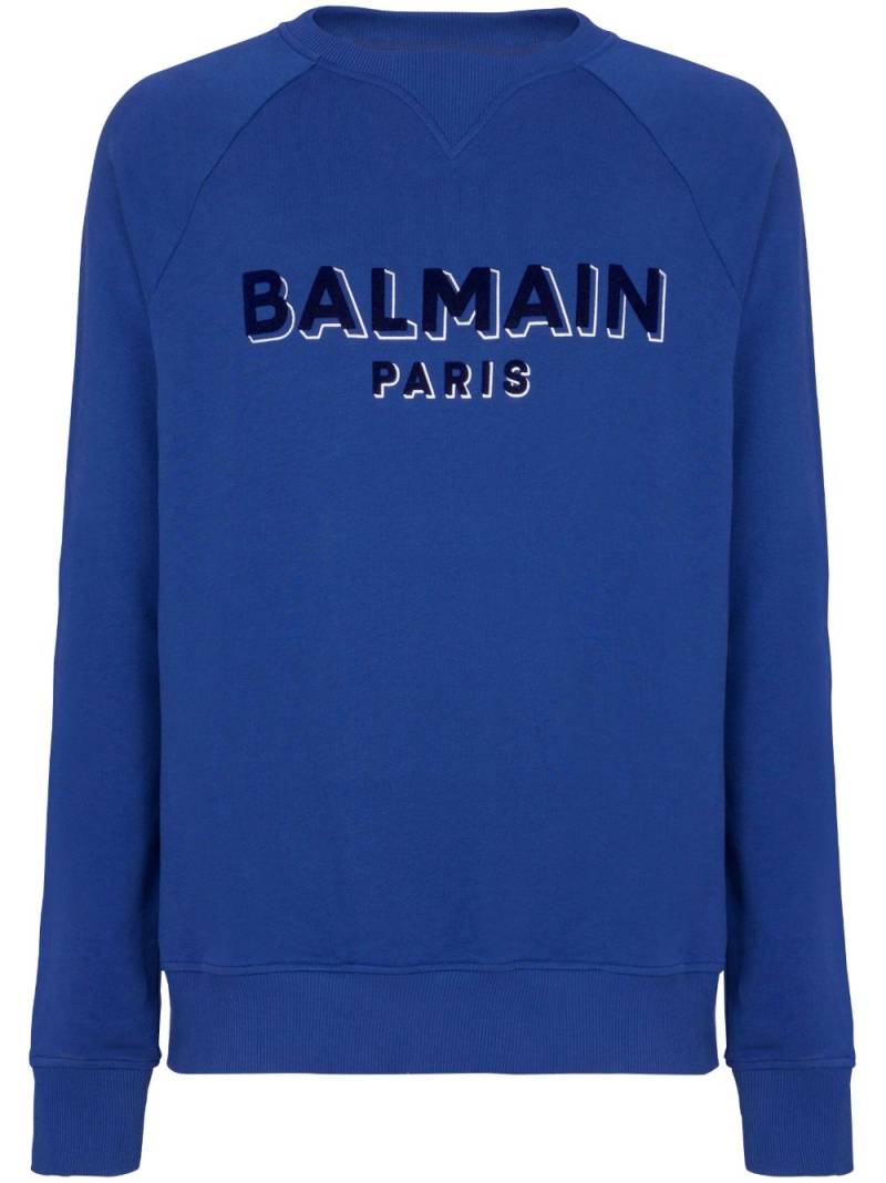 Balmain logo-flocked cotton sweatshirt - Blue von Balmain