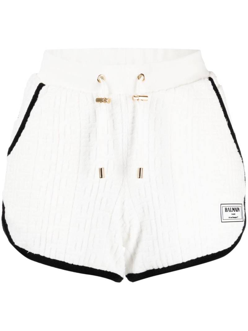 Balmain monogram-motif towel-finish shorts - White von Balmain