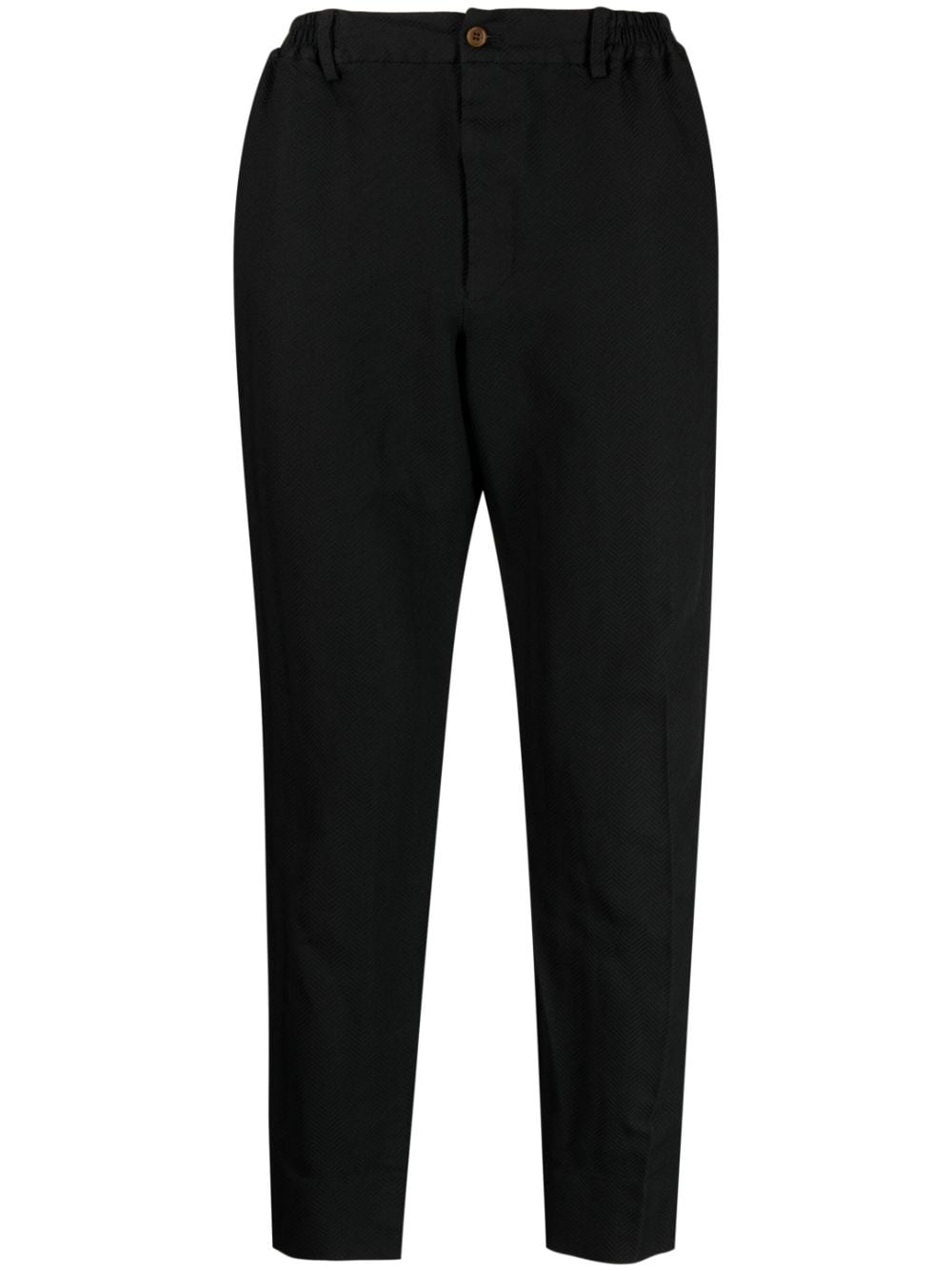 Black Comme Des Garçons chevron-pattern tapered trousers von Black Comme Des Garçons