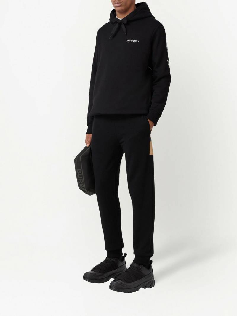 Burberry check-panelled track pants - Black von Burberry