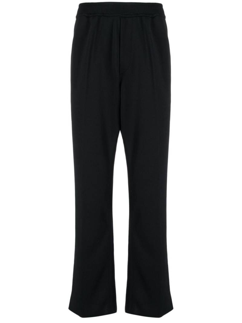 CFCL pressed-crease elasticated-waist trousers - Black von CFCL