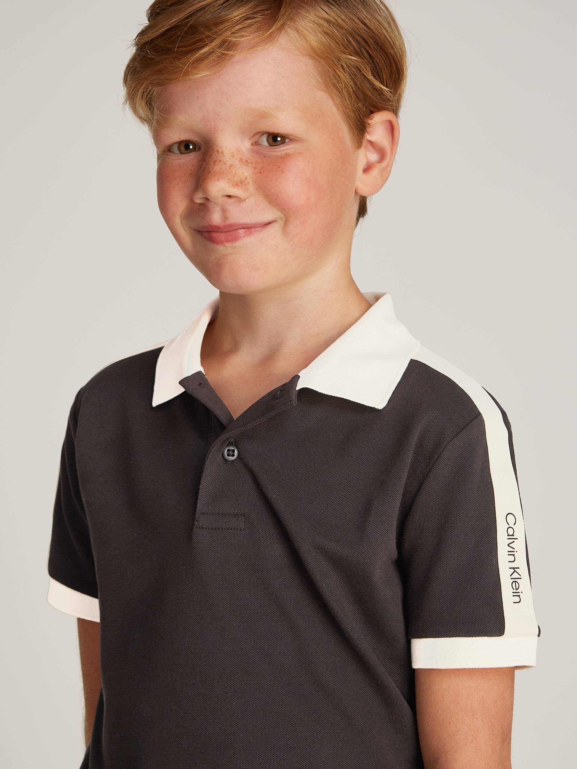 Calvin Klein Jeans Poloshirt »SS POLO PIQUE WITH TAPE«, mit Logoschriftzug Calvin Klein Jeans Poloshirt »SS POLO PIQUE WITH TAPE«, mit Logoschriftzug von Calvin Klein Jeans