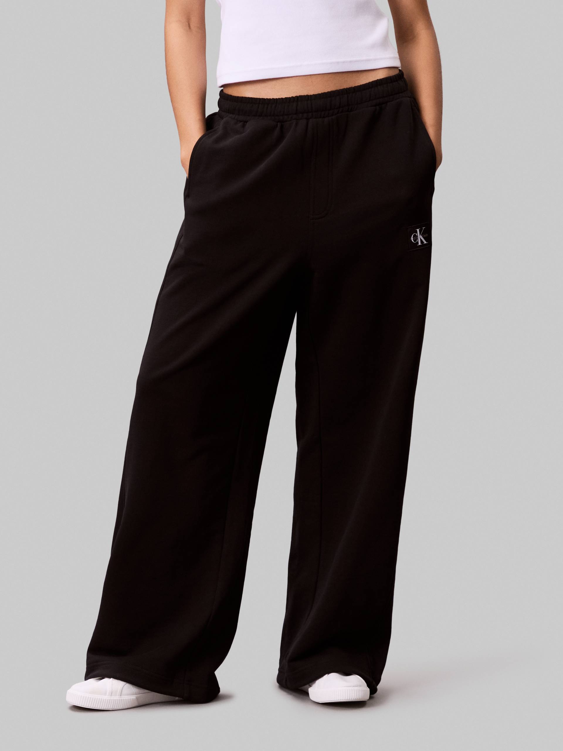 Calvin Klein Jeans Sweathose »A- FRENCH TERRY BADGE LOGO PANT«, mit weitem Bein Calvin Klein Jeans Sweathose »A- FRENCH TERRY BADGE LOGO PANT«, mit weitem Bein von Calvin Klein Jeans