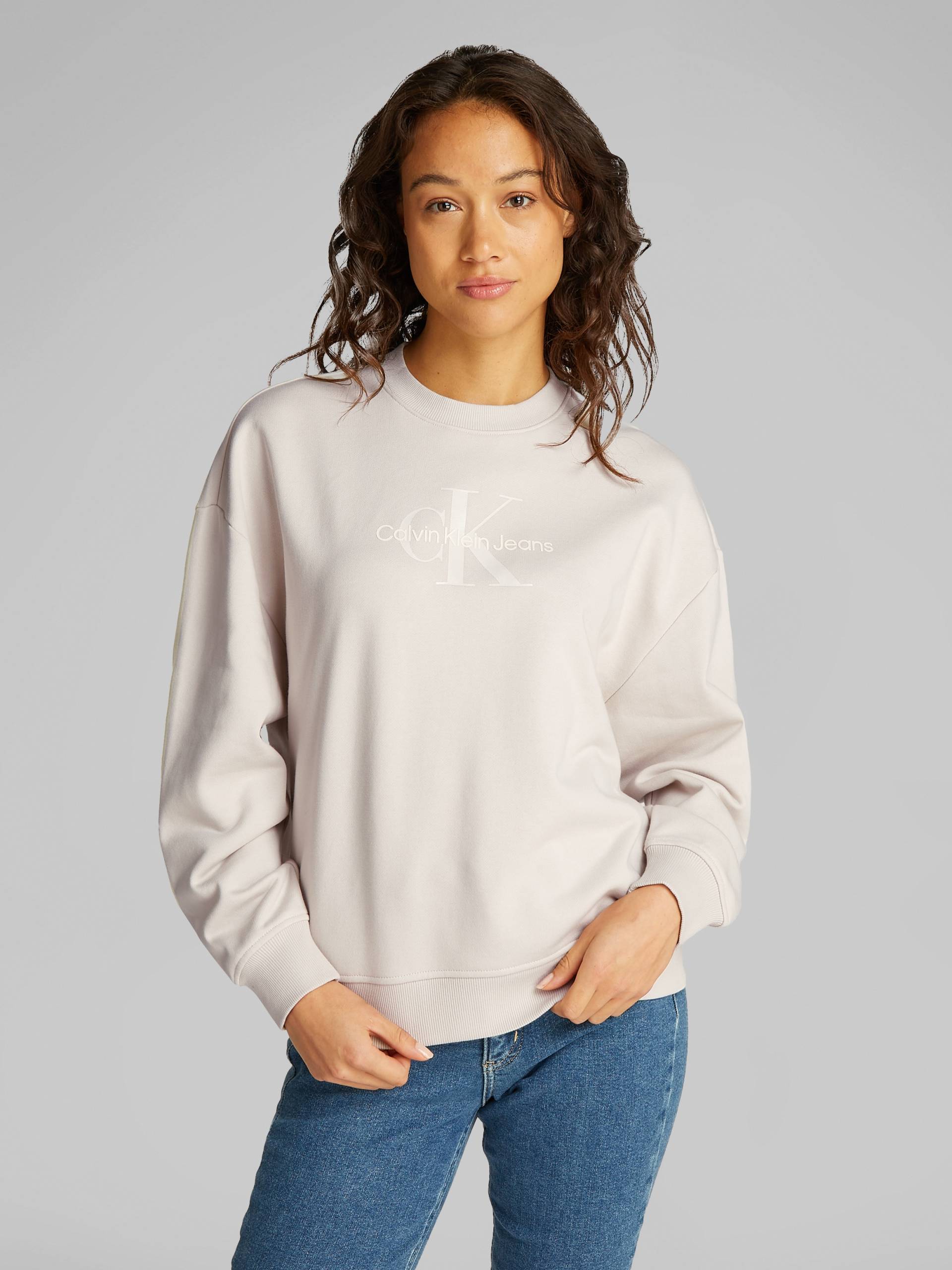 Calvin Klein Jeans Sweatshirt »GLOSSY MONOLOGO REGULAR CREWNECK«, mit Logodruck Calvin Klein Jeans Sweatshirt »GLOSSY MONOLOGO REGULAR CREWNECK«, mit Logodruck von Calvin Klein Jeans