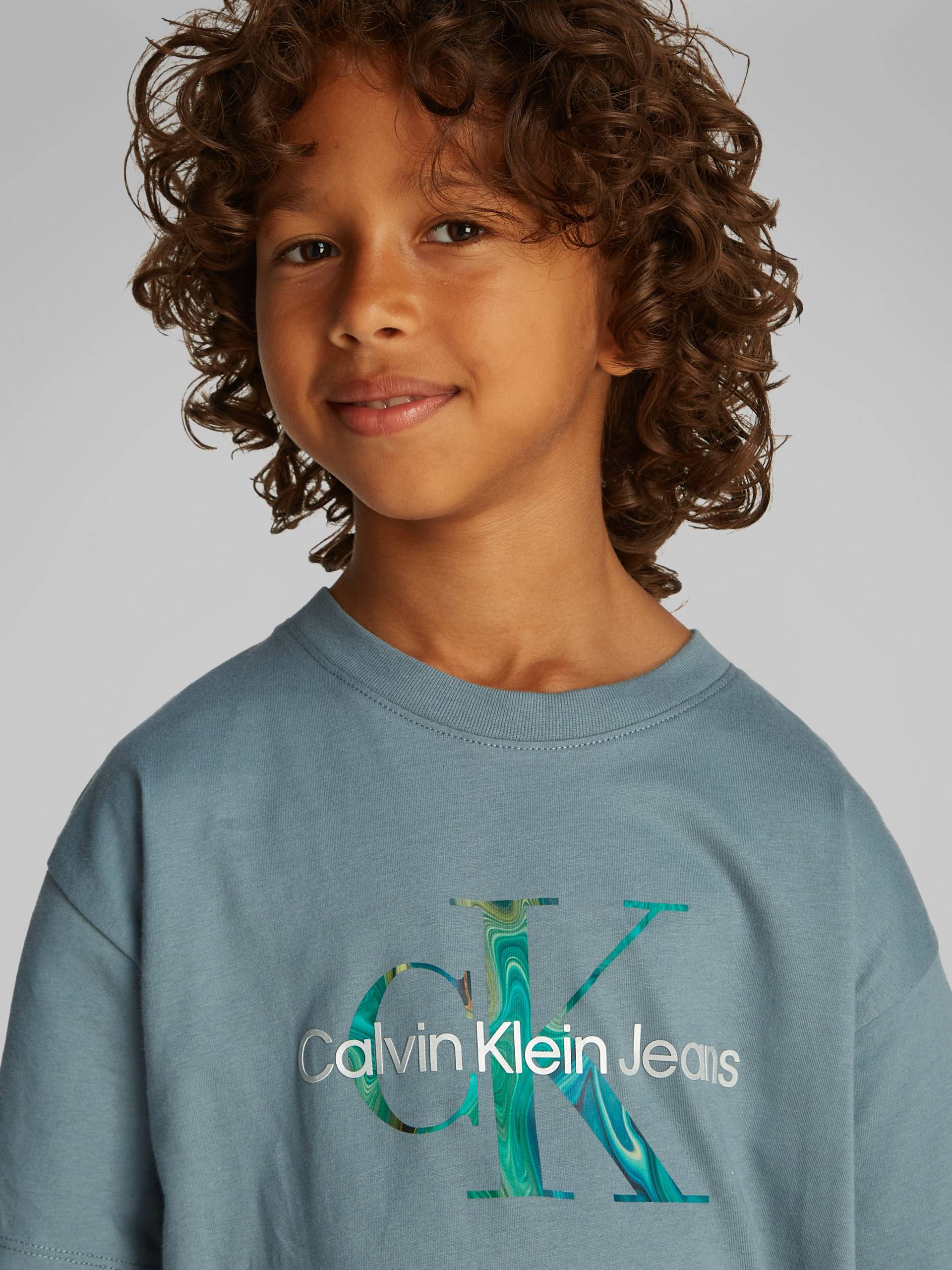 Calvin Klein Jeans T-Shirt »OCEAN SWIRL MONO T-SHIRT«, mit grossem Logodruck Calvin Klein Jeans T-Shirt »OCEAN SWIRL MONO T-SHIRT«, mit grossem Logodruck von Calvin Klein Jeans