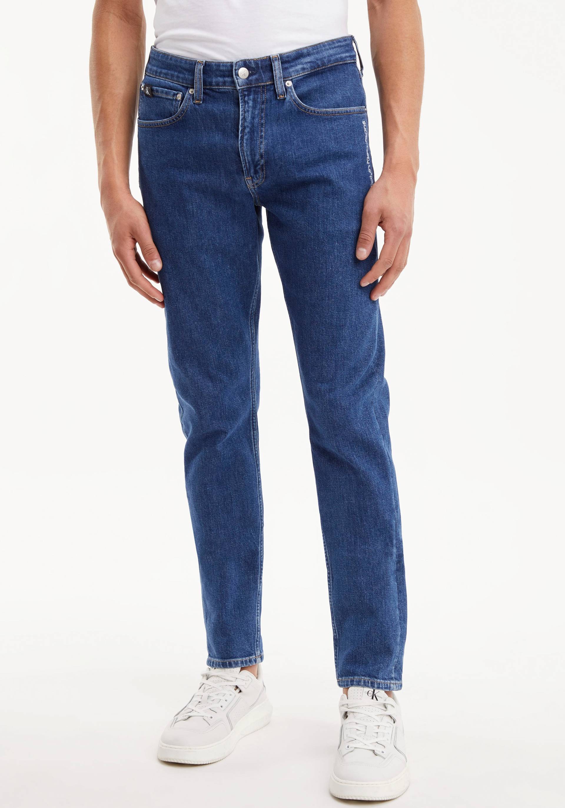Calvin Klein Jeans Tapered-fit-Jeans »SLIM TAPER«, mit Calvin Klein Leder-Badge von Calvin Klein Jeans