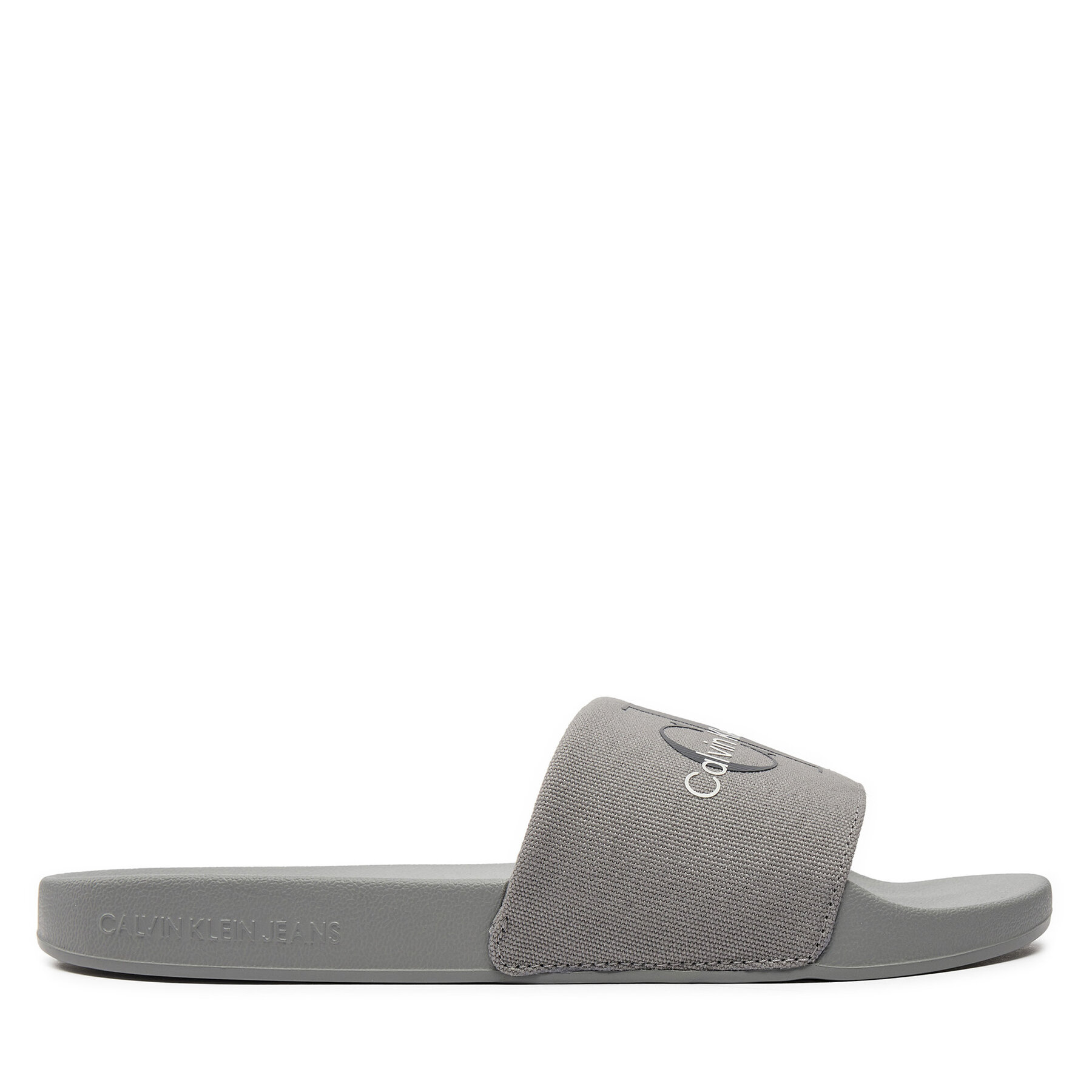 Pantoletten Calvin Klein Jeans Slide Monogram Co YM0YM00061 Grau Pantoletten Calvin Klein Jeans Slide Monogram Co YM0YM00061 Grau von Calvin Klein Jeans