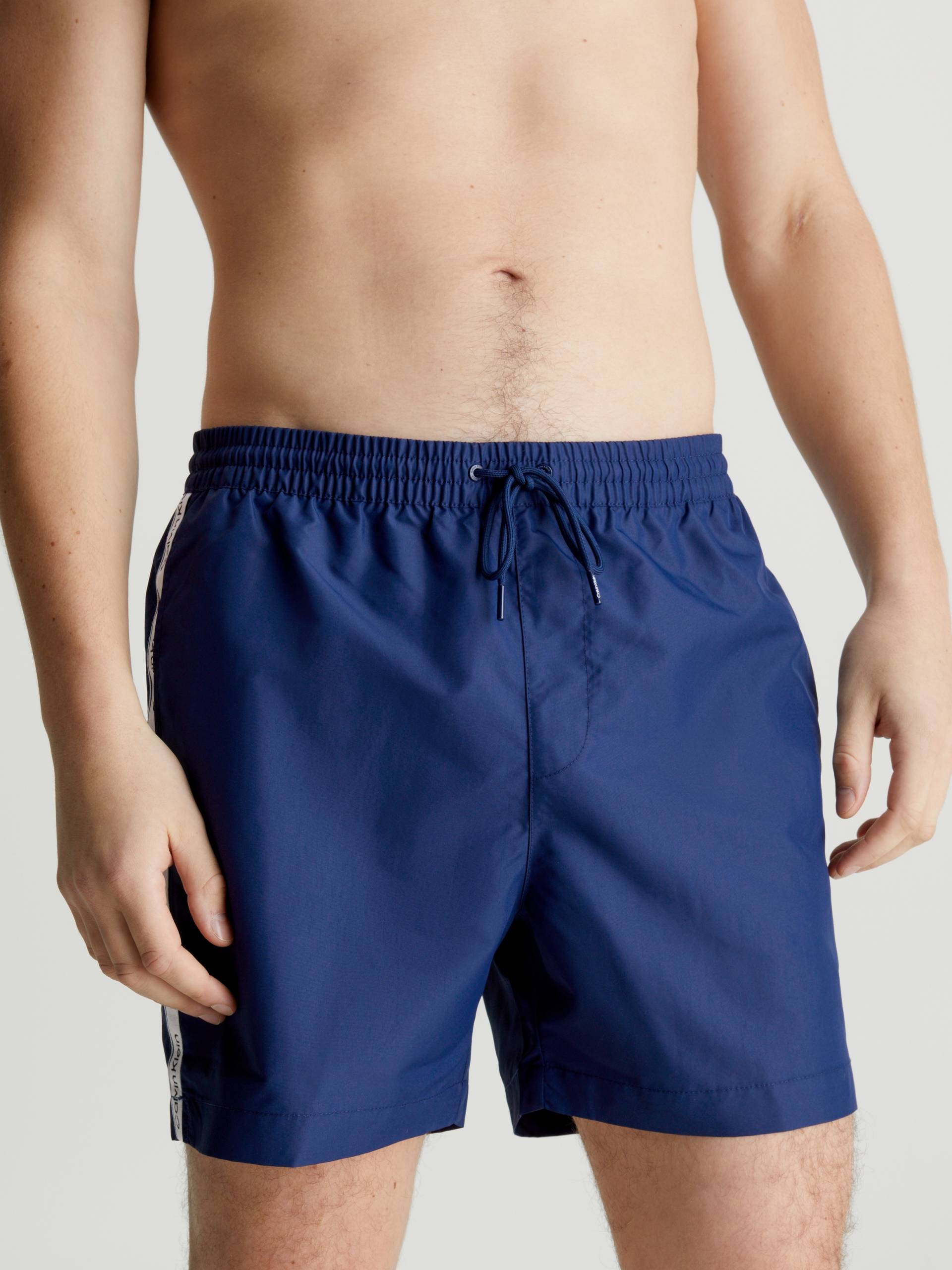 Calvin Klein Swimwear Badeshorts »MEDIUM DRAWSTRING«, mit seitlichem Logoschriftzug Calvin Klein Swimwear Badeshorts »MEDIUM DRAWSTRING«, mit seitlichem Logoschriftzug von Calvin Klein Swimwear