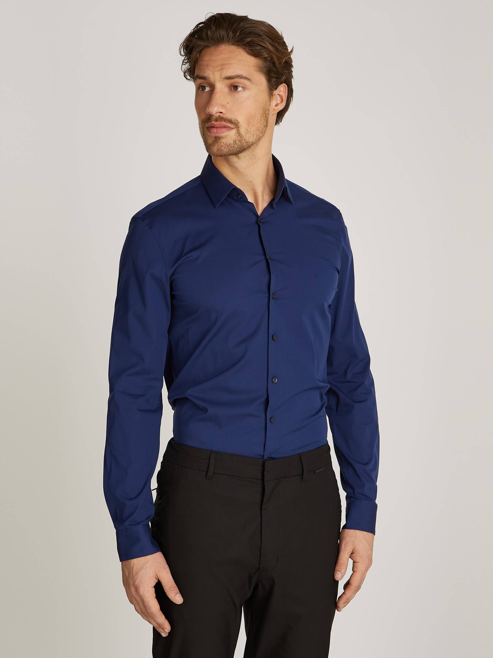 Calvin Klein Businesshemd »POPLIN STRETCH SLIM SHIRT«, mit Kentkragen, Logoprint auf Brusthöhe Calvin Klein Businesshemd »POPLIN STRETCH SLIM SHIRT«, mit Kentkragen, Logoprint auf Brusthöhe von Calvin Klein