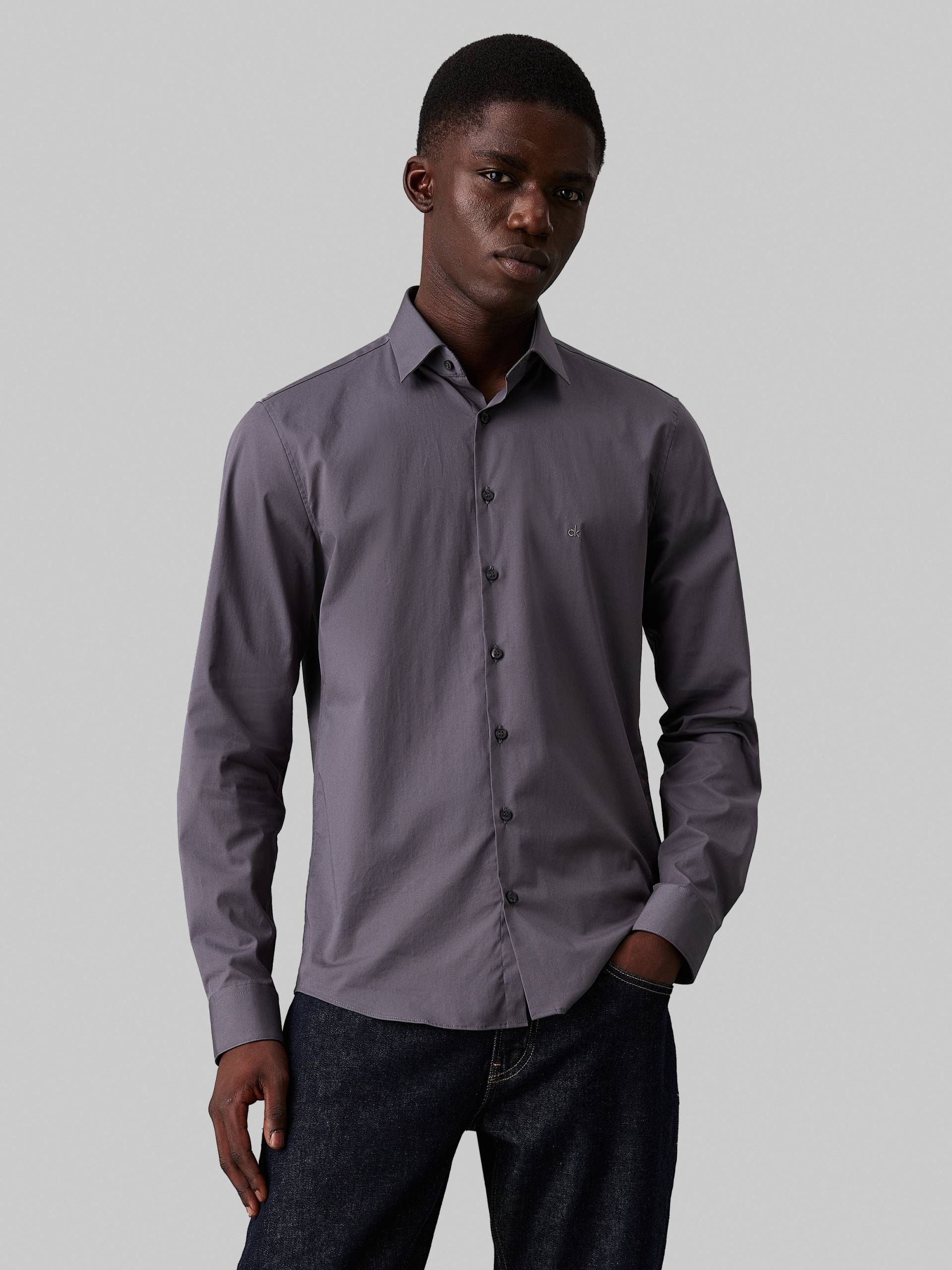 Calvin Klein Businesshemd »POPLIN STRETCH SLIM SHIRT«, mit Kentkragen, Logoprint auf Brusthöhe Calvin Klein Businesshemd »POPLIN STRETCH SLIM SHIRT«, mit Kentkragen, Logoprint auf Brusthöhe von Calvin Klein
