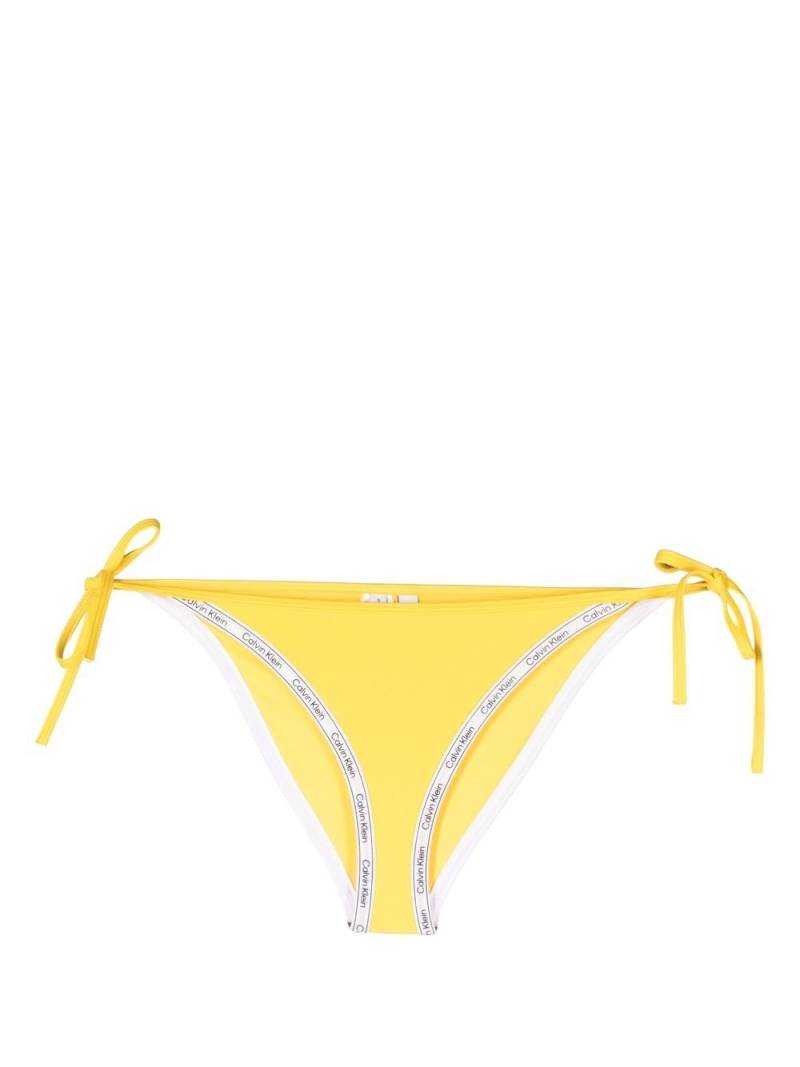 Calvin Klein logo-print strap bikini bottoms - Yellow von Calvin Klein