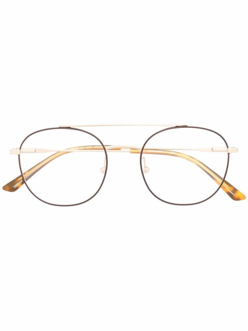 Calvin Klein round-frame glasses - Gold von Calvin Klein