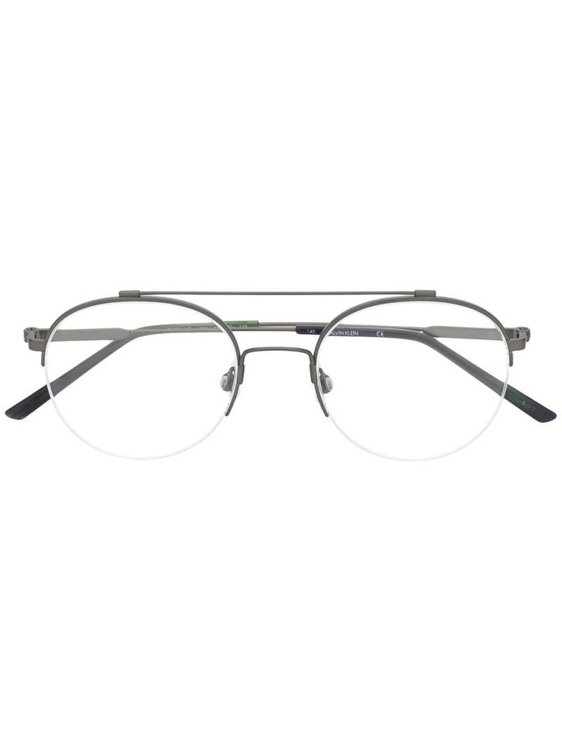Calvin Klein round frame glasses - Grey von Calvin Klein