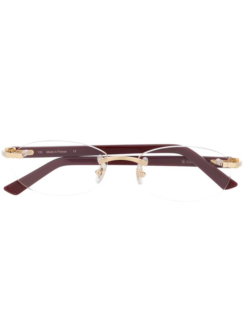 Cartier Eyewear rimless oval optical glasses - Red von Cartier Eyewear