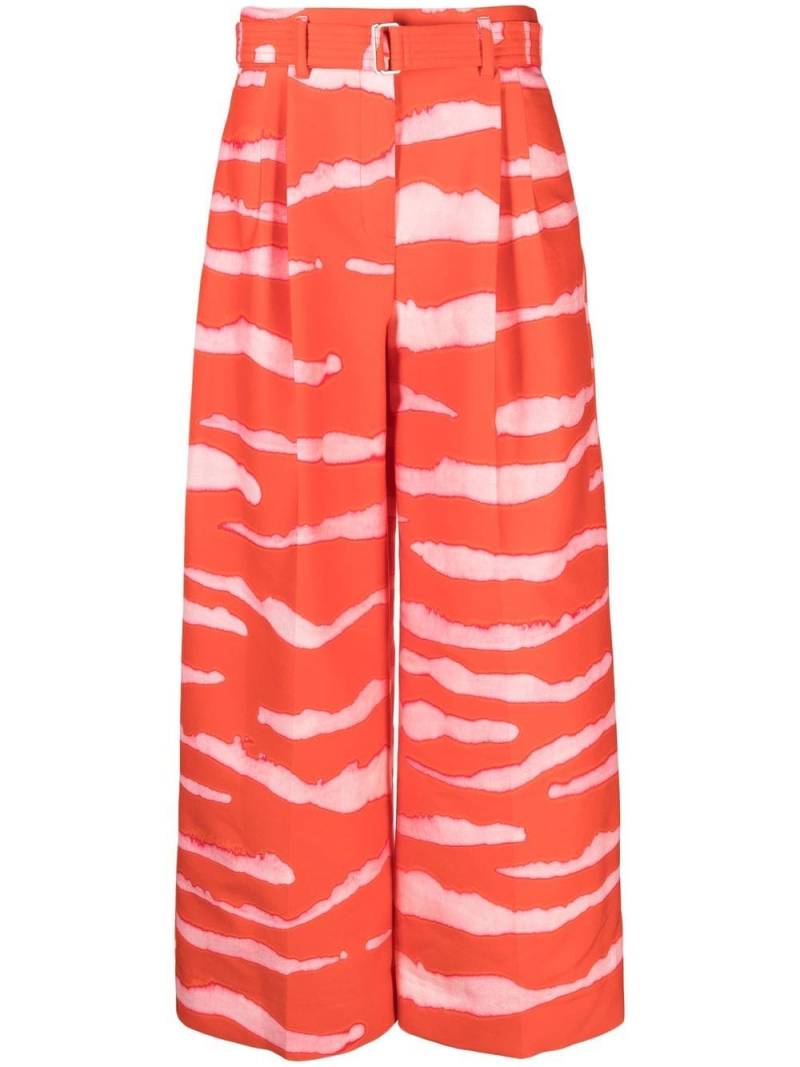 Christian Wijnants Pliza abstract-print pleated trousers - Red von Christian Wijnants