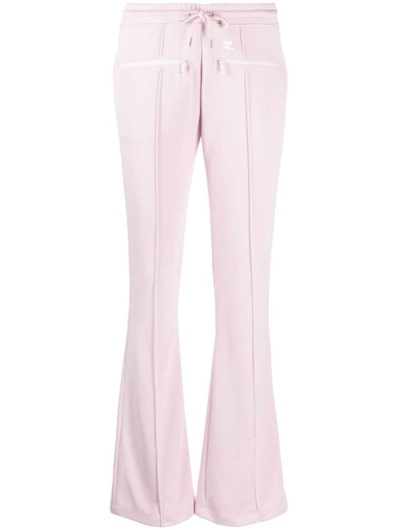 Courrèges logo-patch flared trousers - Pink von Courrèges