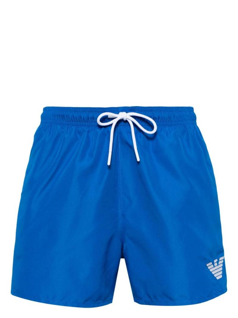 Emporio Armani eagle logo-embroidered swim shorts - Blue von Emporio Armani