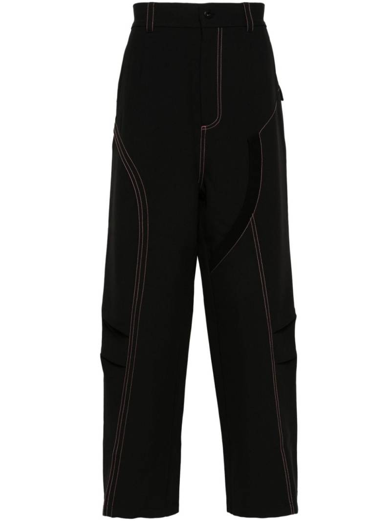 Feng Chen Wang contrast-stitching trousers - Black von Feng Chen Wang