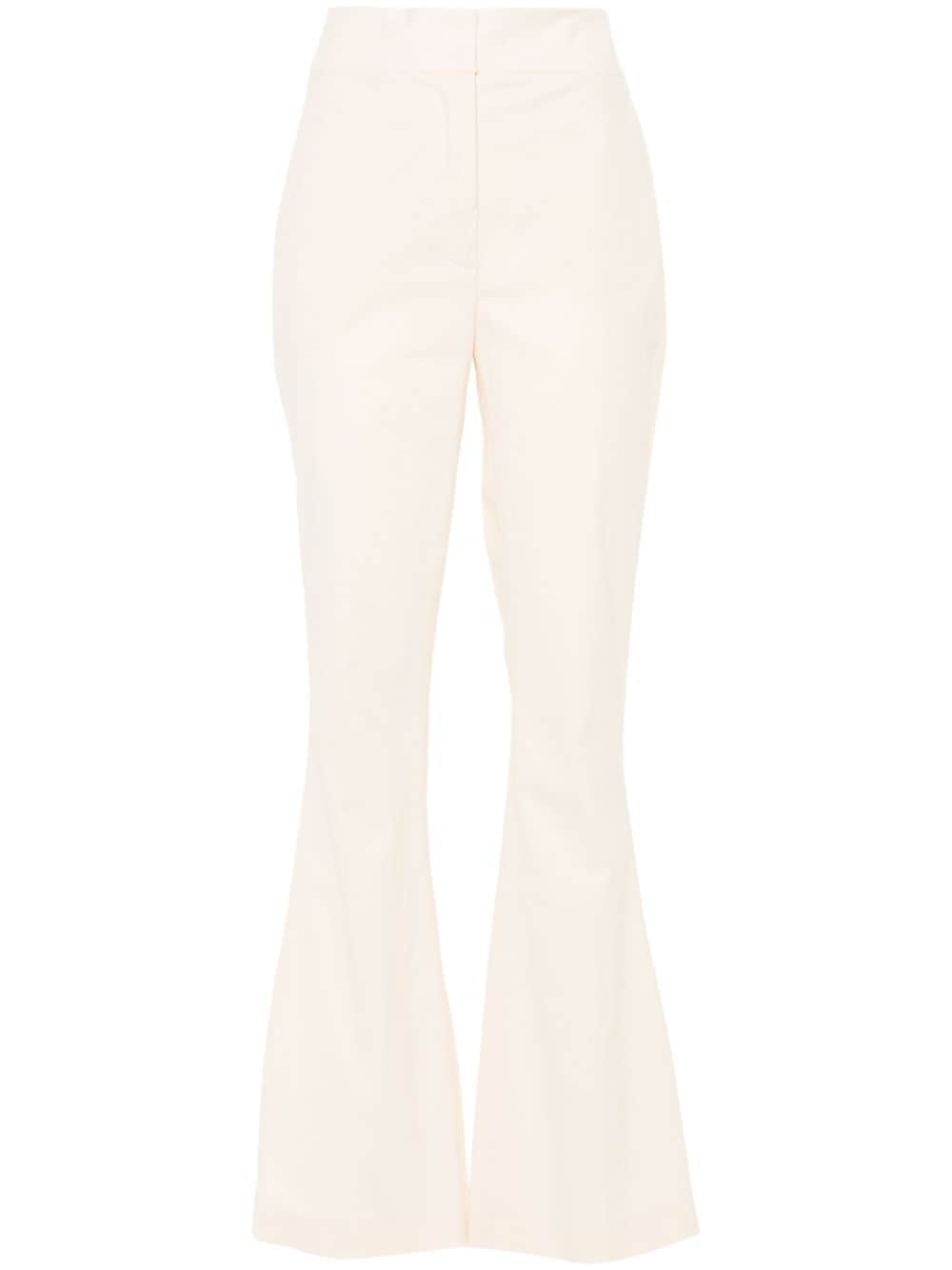 Genny crinkled-finish flared trousers - Neutrals von Genny