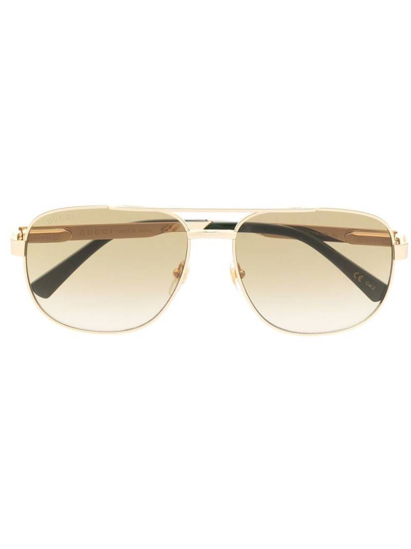 Gucci Eyewear logo-engrave pilot-frame sunglasses - Gold von Gucci Eyewear
