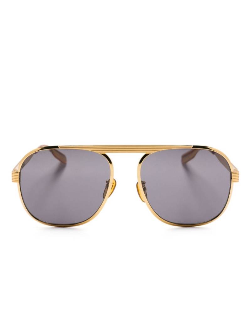 Gucci Eyewear navigator-grame sunglasses - Gold von Gucci Eyewear