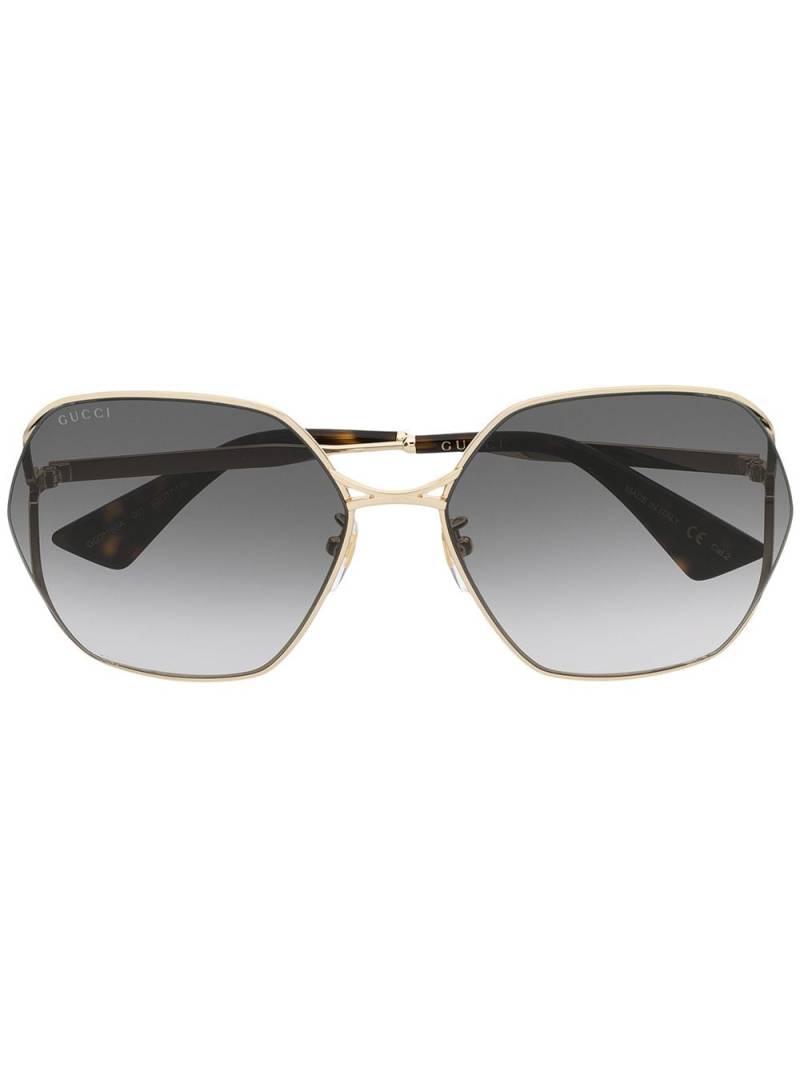 Gucci Eyewear oval-frame sunglasses - Gold von Gucci Eyewear