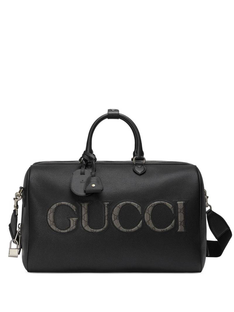 Gucci logo-embossed leather duffle bag - Black von Gucci