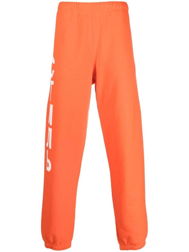 Heron Preston logo-print track pants - Orange von Heron Preston