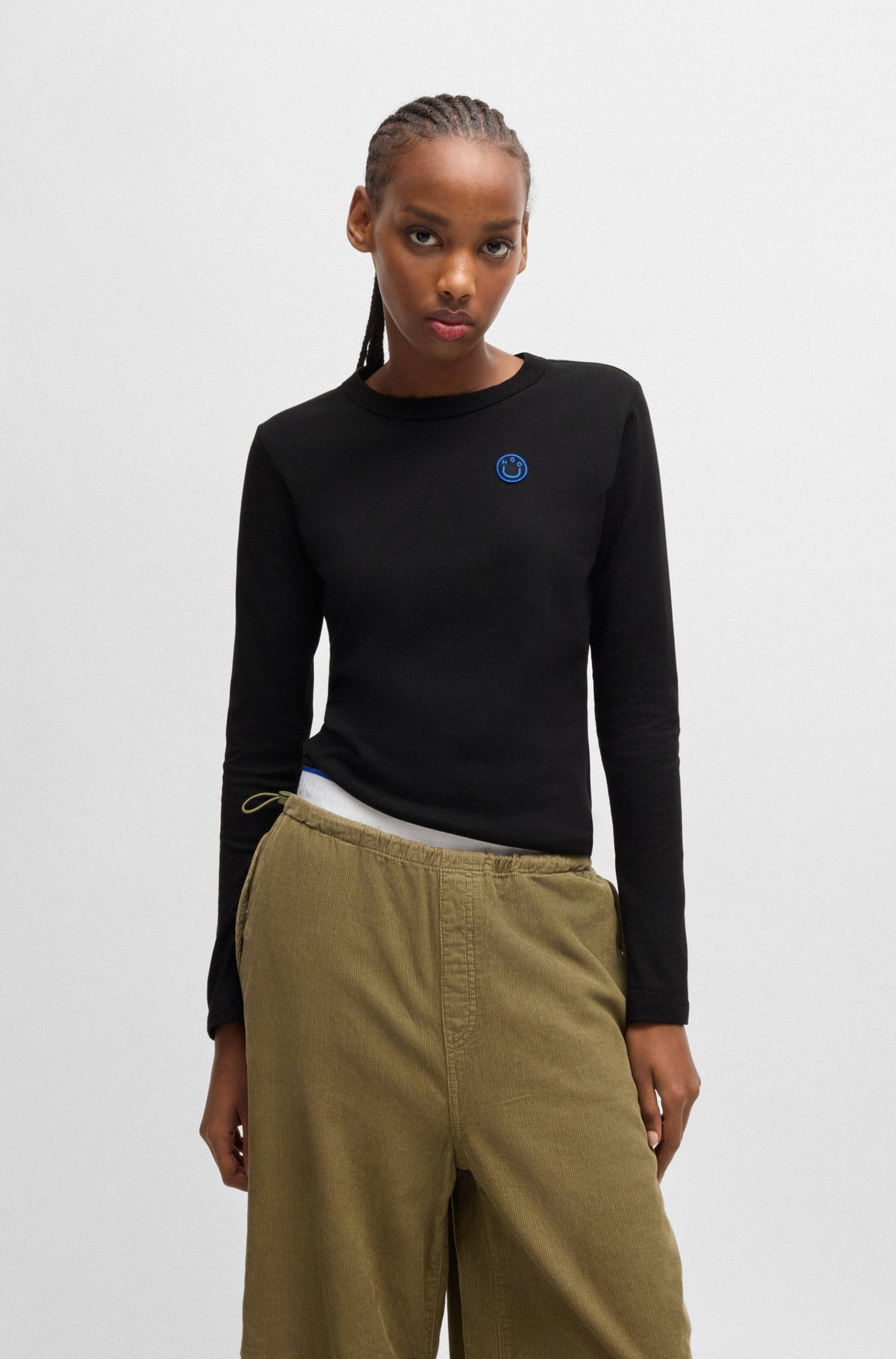 HUGO Blue Longsleeve »Daliria_B«, mit Label-Badge mit HAPPY HUGO Logo HUGO Blue Longsleeve »Daliria_B«, mit Label-Badge mit HAPPY HUGO Logo von HUGO Blue