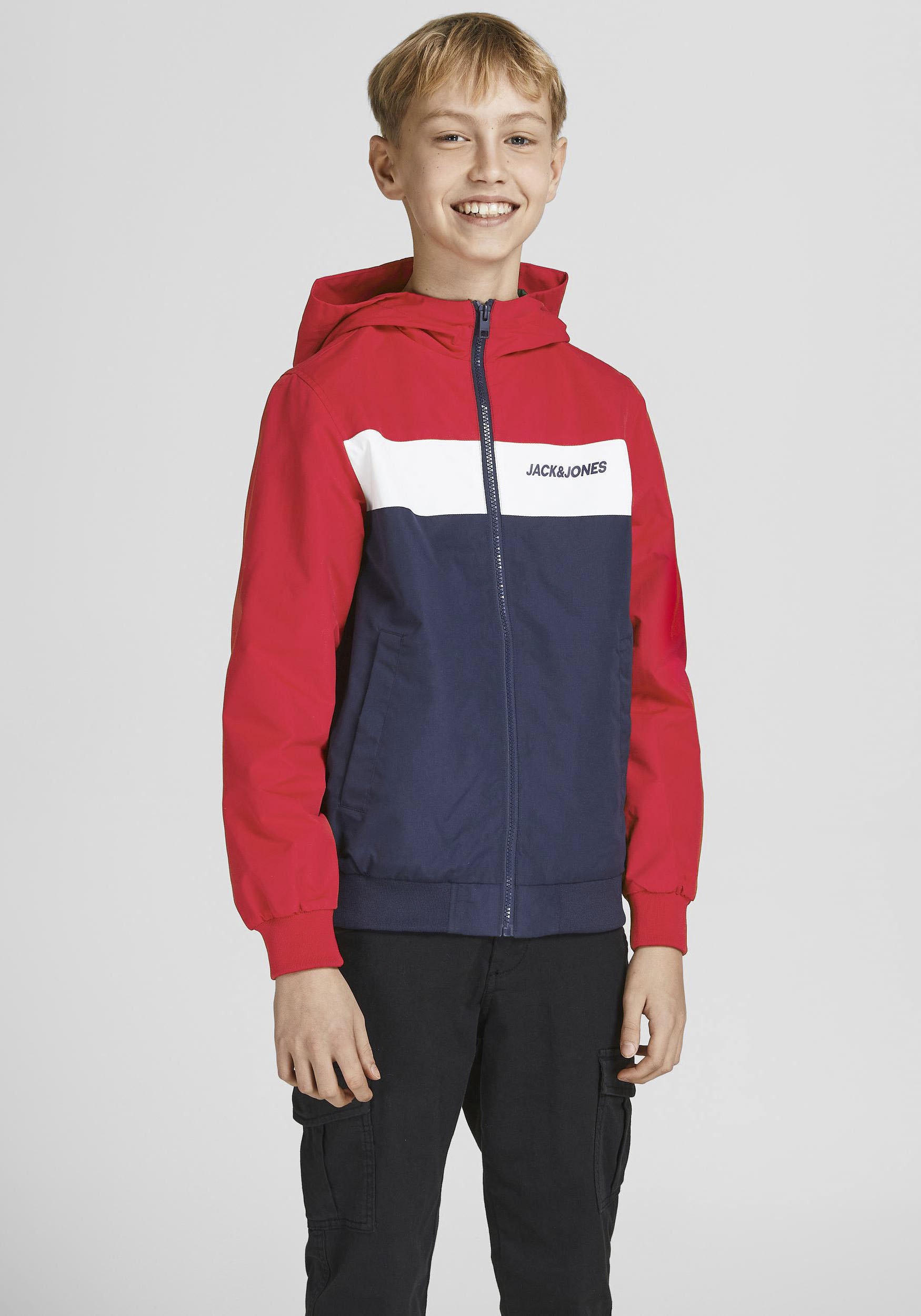 Jack & Jones Junior Softshelljacke »JJERUSH BLOCKING HOOD BOMBER NOOS JNR«, mit Kapuze von Jack & Jones Junior