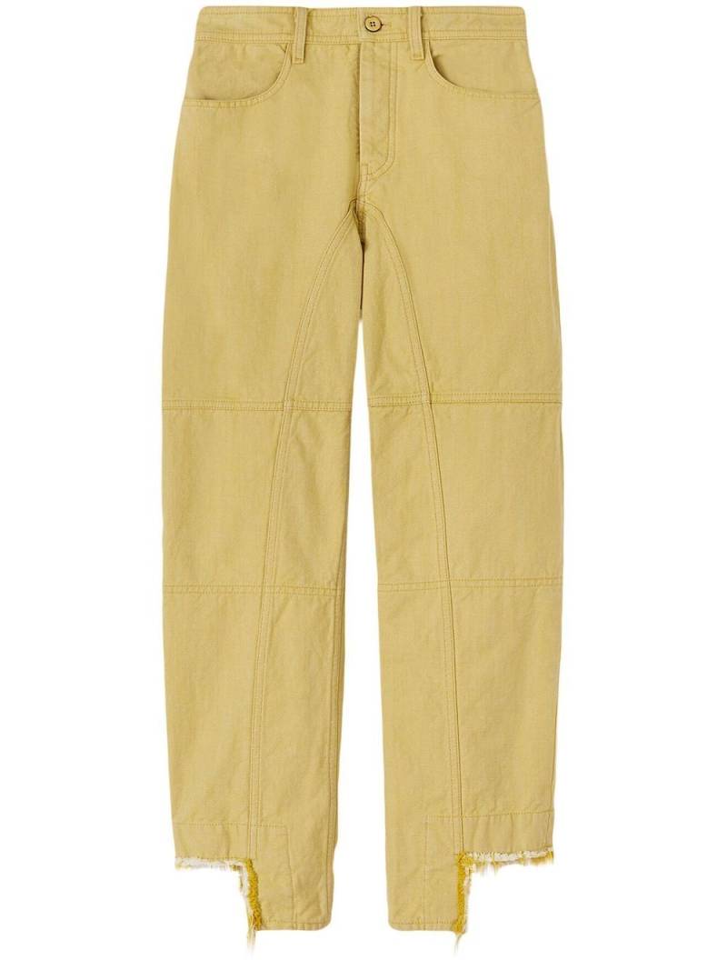 Jil Sander asymmetric-hem fringed jeans - Yellow von Jil Sander