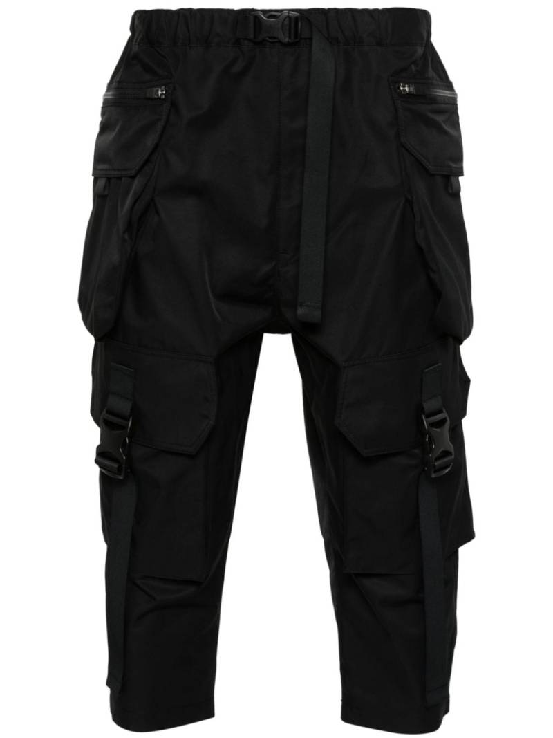 Junya Watanabe MAN cropped tapered trousers - Black von Junya Watanabe MAN