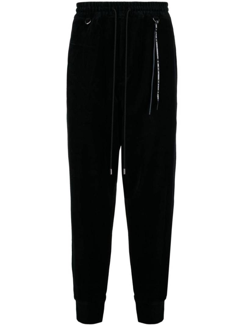 Mastermind World logo-jacquard tapered track pants - Black von Mastermind World