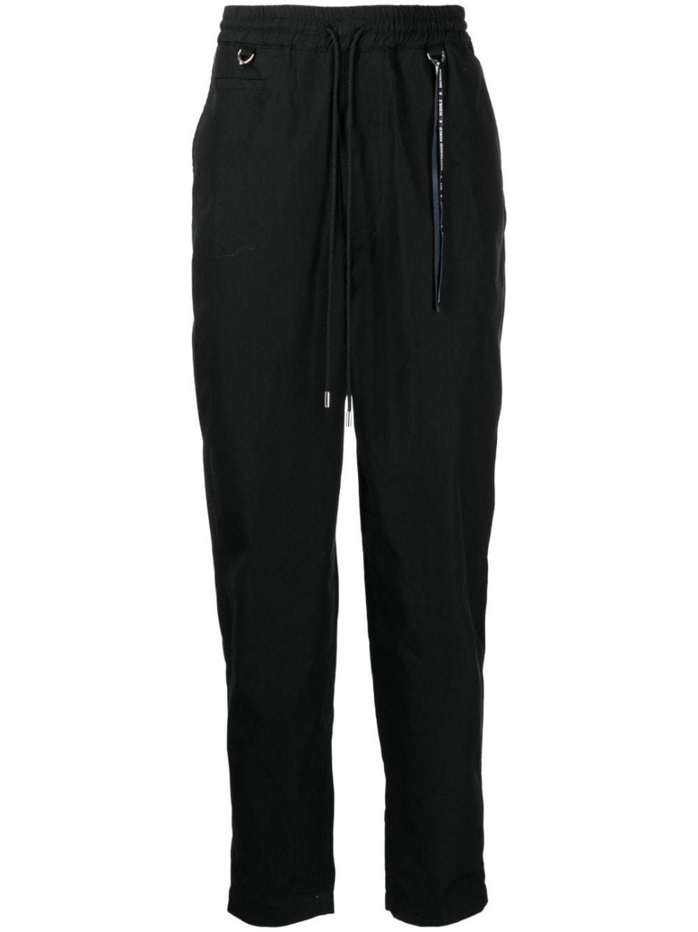 Mastermind World logo-print tapered-leg trousers - Black von Mastermind World