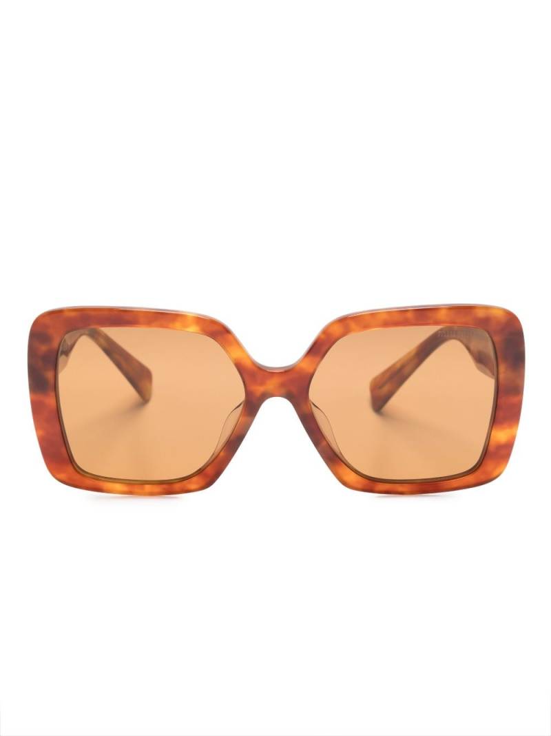 Miu Miu Eyewear tortoiseshell logo-arm sunglasses - Brown von Miu Miu Eyewear
